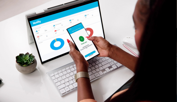 Woman submitting and incident report through Notify