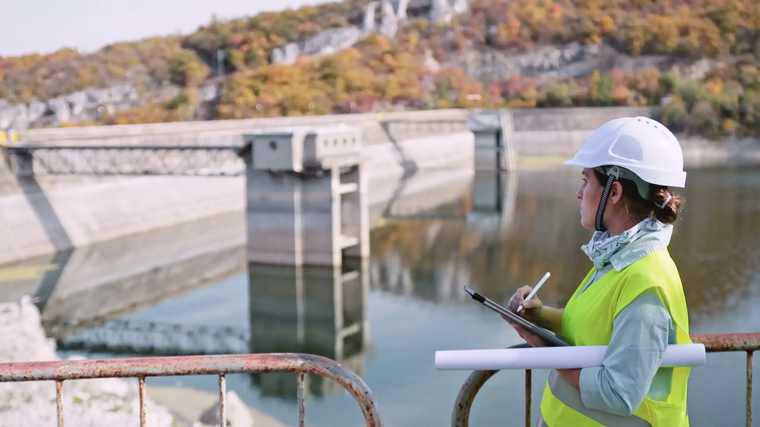 Woman in hi vis carrying out regional water safety checks