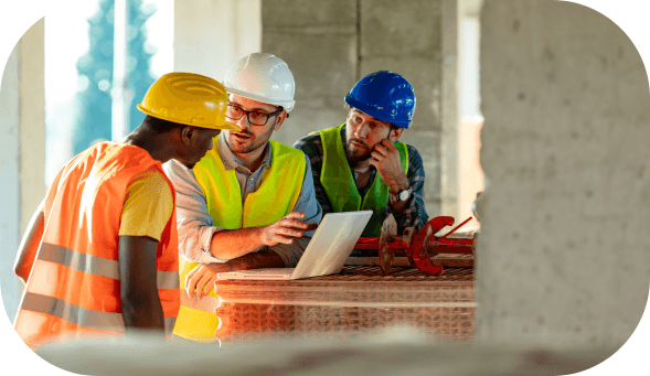 Construction workers discussing controls